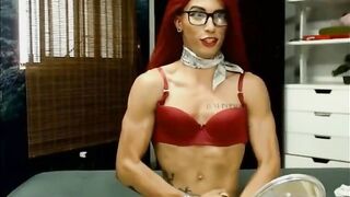 Watch this redhead T- girl with muscles take on a big cock in hot lingerie and lingerie-clad ass